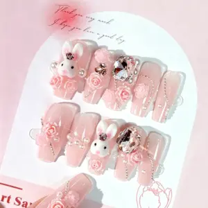Side view of sheer press-on nail showing thin, flexible design