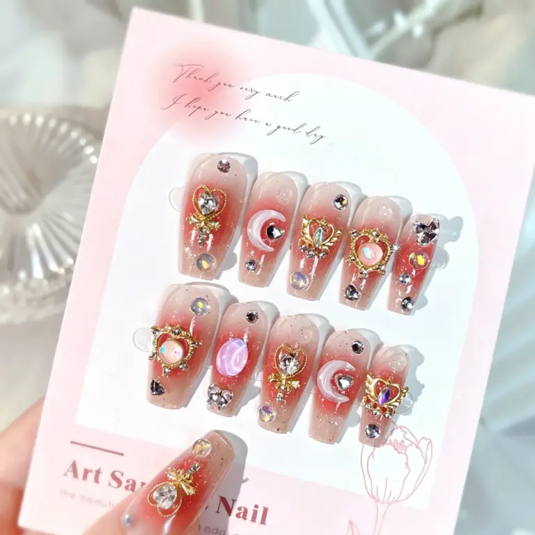Close-up of rhinestone and gradient base on anime press-on nail