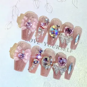 Pink Heart Rhinestone and Silver Butterfly Detail on Nude Pink Press On Nail