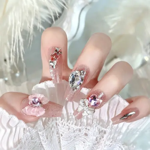 3D Pink Bow and Heart Rhinestone Detail on Nude Pink Glitter Press On Nail