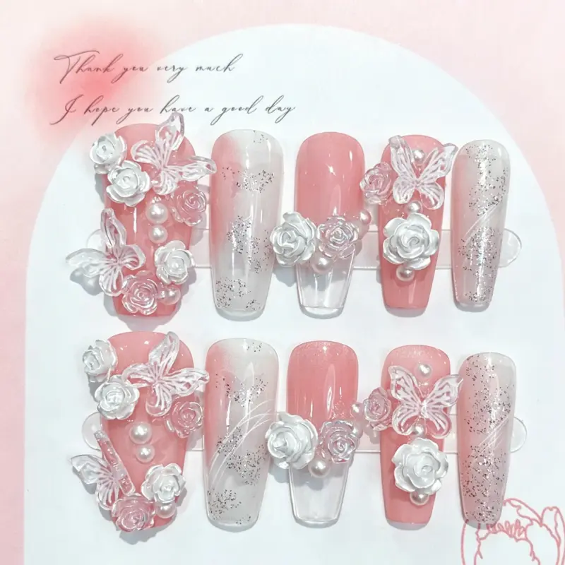 Transparent Butterfly Charm Detail on Pink Press On Nail