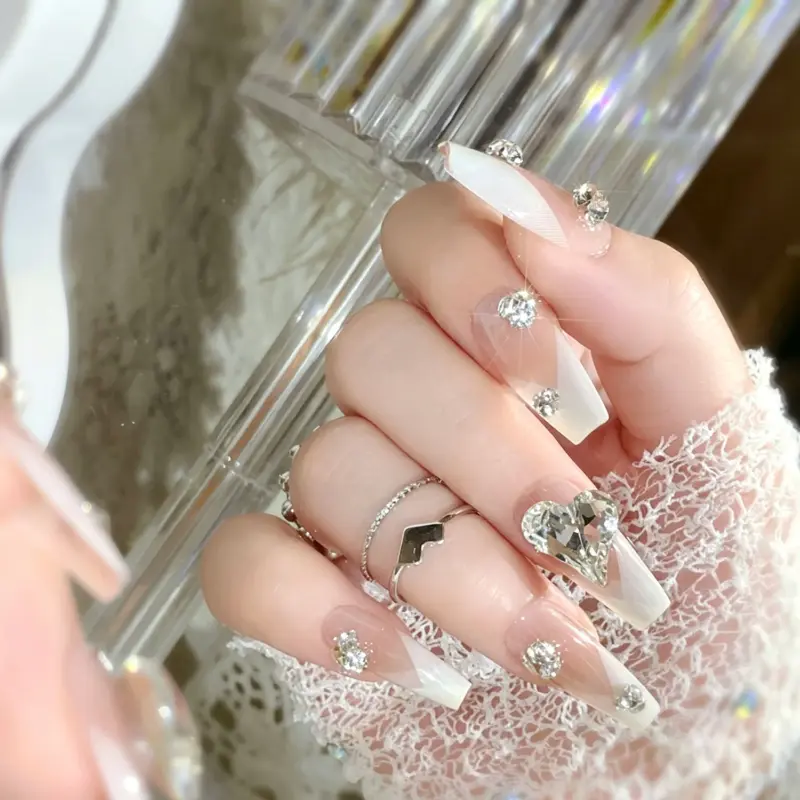 Elegant Nude White French Press On Nails with Heart Crystal Close Up