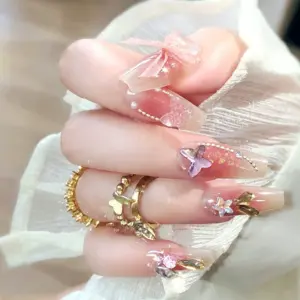 Iridescent Butterfly Charm Detail on Blush Pink Press On Nail