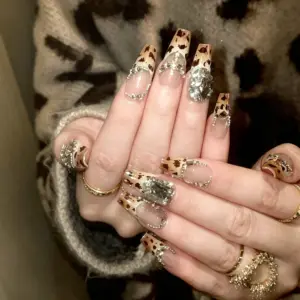 Leopard Print French Tip Detail on Chic Press-On Nail Leopard Print French Tip Detail on Chic Press On Nail