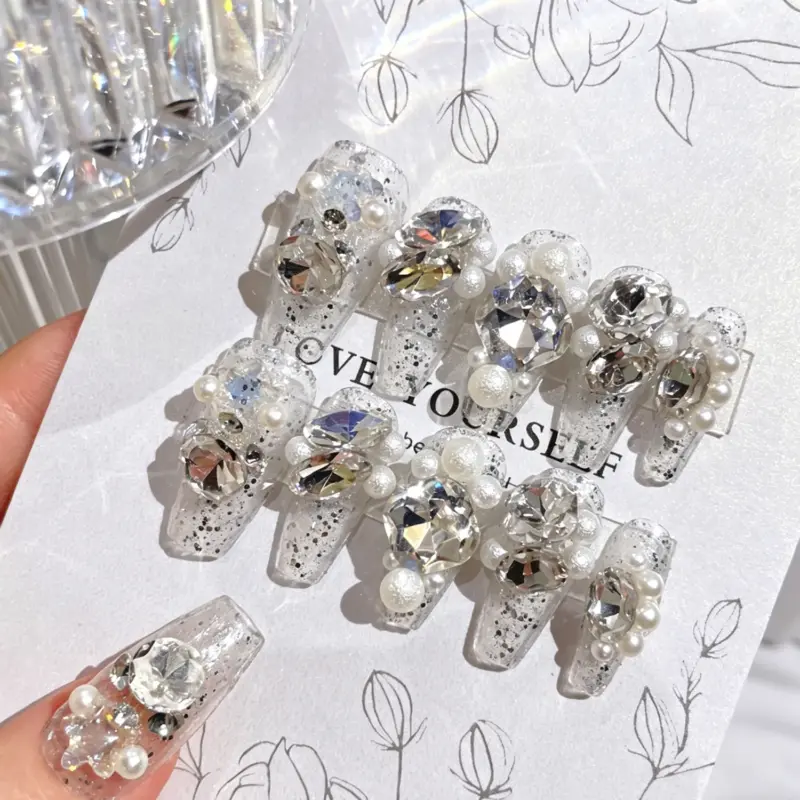 Flat Lay of 24 Piece Influencer Bling Press On Nail Collection