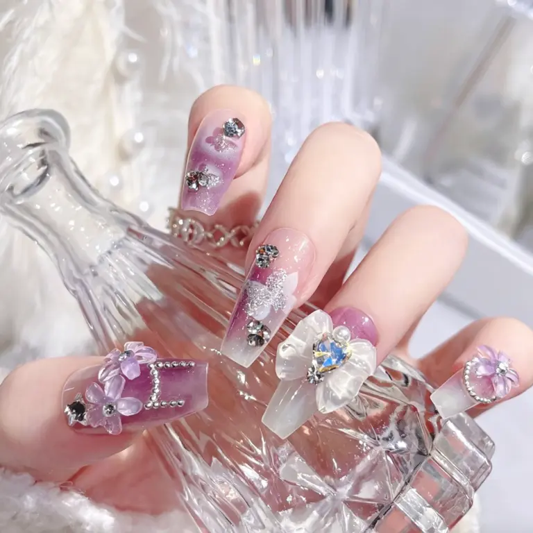 24-piece bow press-on nails flat lay, full size set, cute